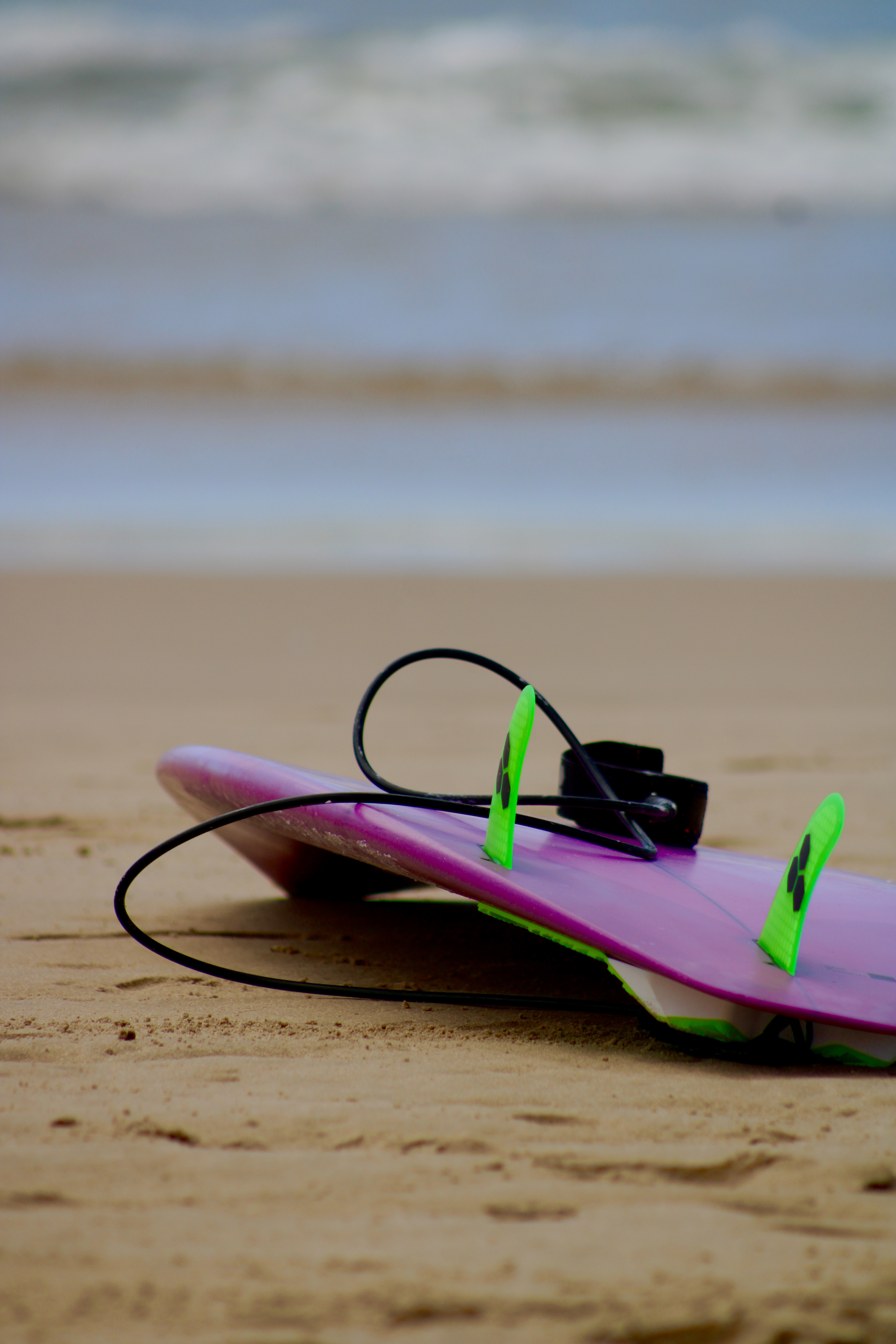 Surfboard on sand